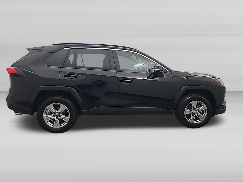 2025 Toyota RAV4 — rear three-quarter view