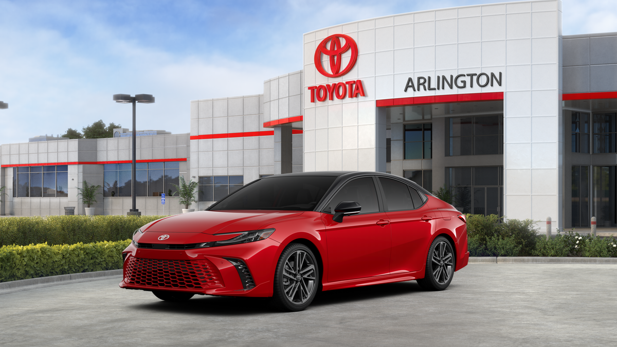 2026 Toyota Camry XSE in Supersonic Red With Midnight Black Metallic Roof — front three-quarter view