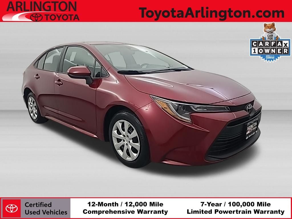 2025 Toyota Corolla LE in Red Mc. — front three-quarter view