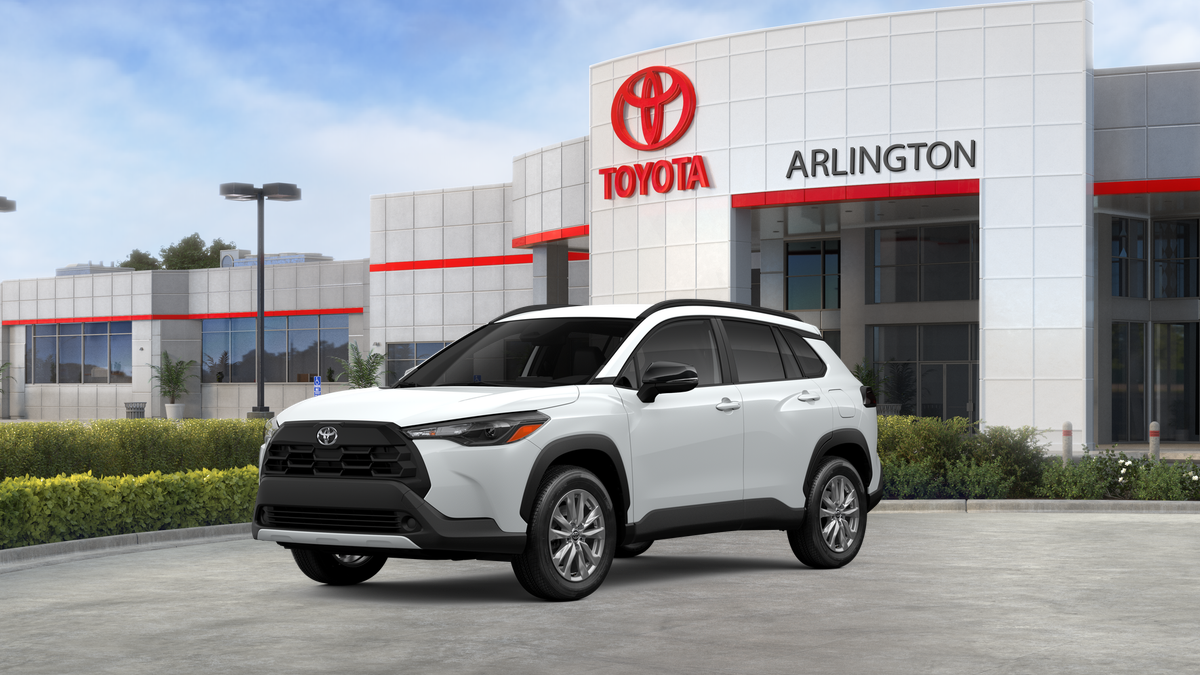 2026 Toyota Corolla Cross LE in Wind Chill Pearl — front three-quarter view