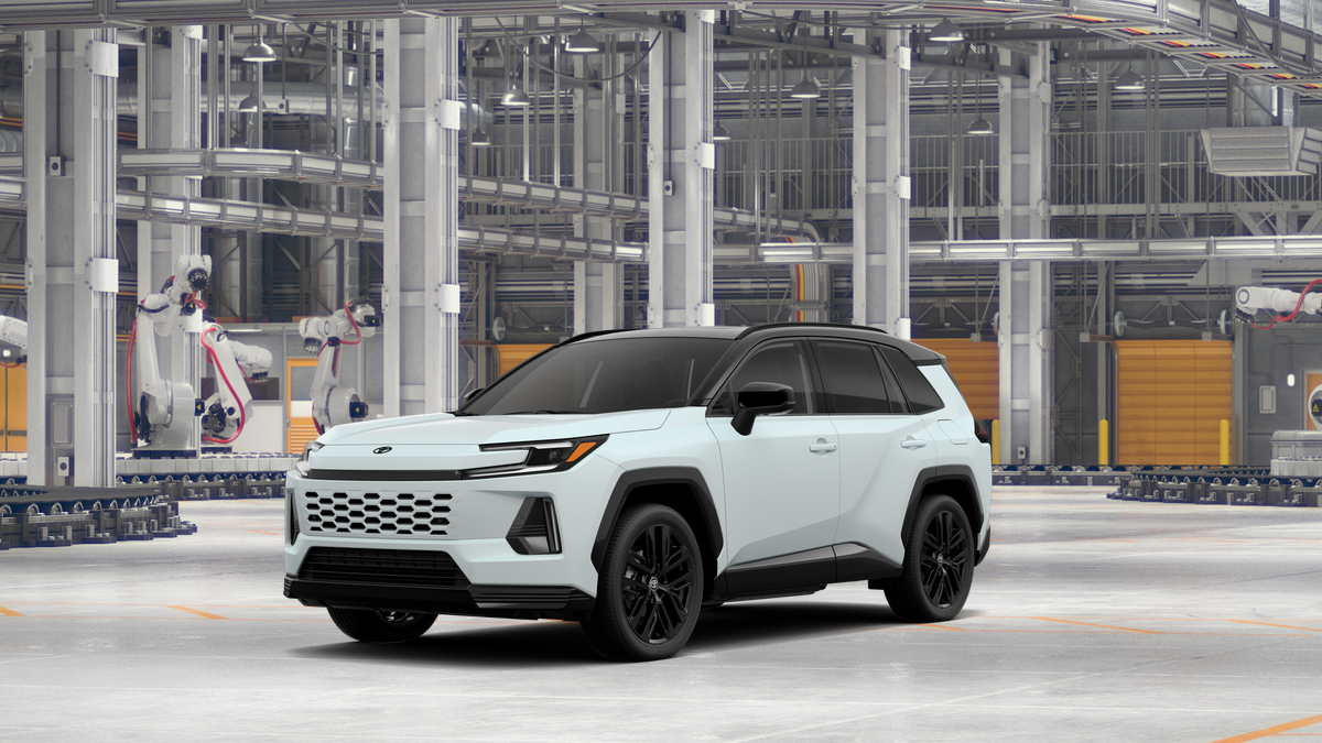 2026 Toyota RAV4 XSE in Wind Chill Pearl With Midnight Black Metallic Roof — front three-quarter view