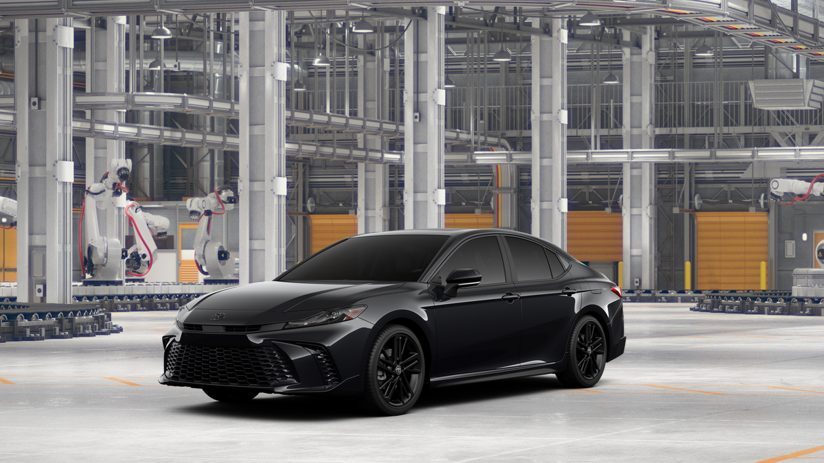2026 Toyota Camry Nightshade in Supersonic Red — front three-quarter view