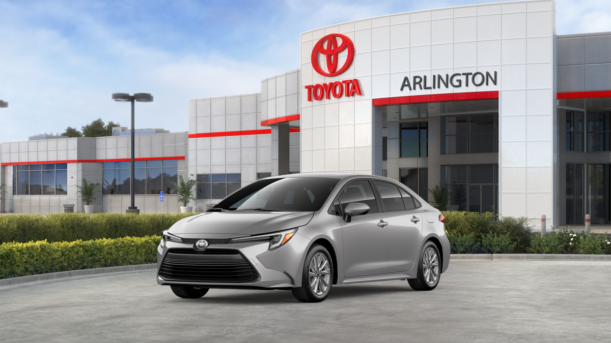 2026 Toyota Corolla Hybrid Hybrid LE in Classic Silver Metallic — front three-quarter view